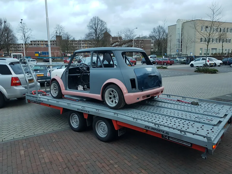 Classic Mini project car on a trailer