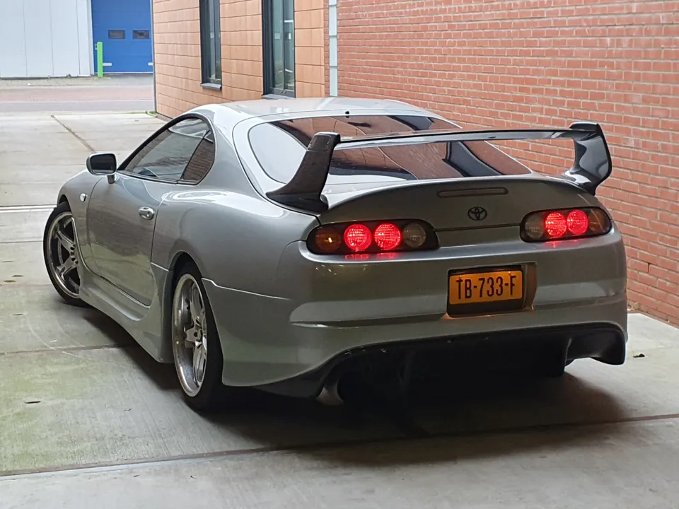 Silver Toyota Supra MK4, rear view