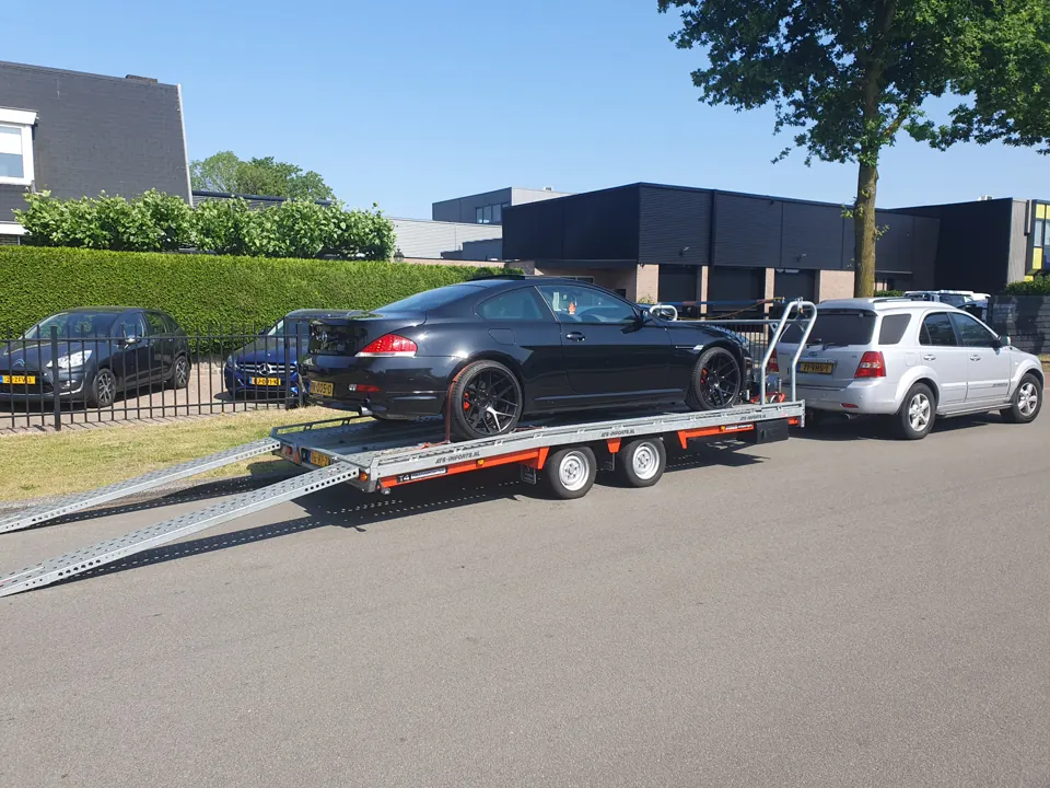 Car transporter and tow vehicle