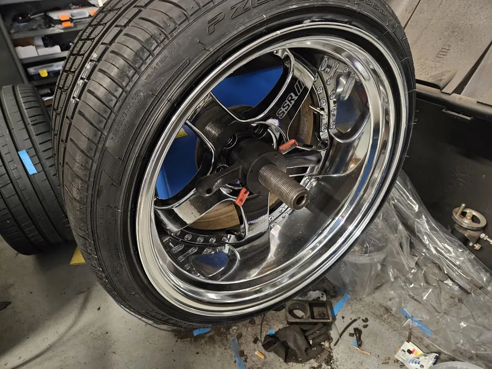 Polished alloy wheel and tyre
