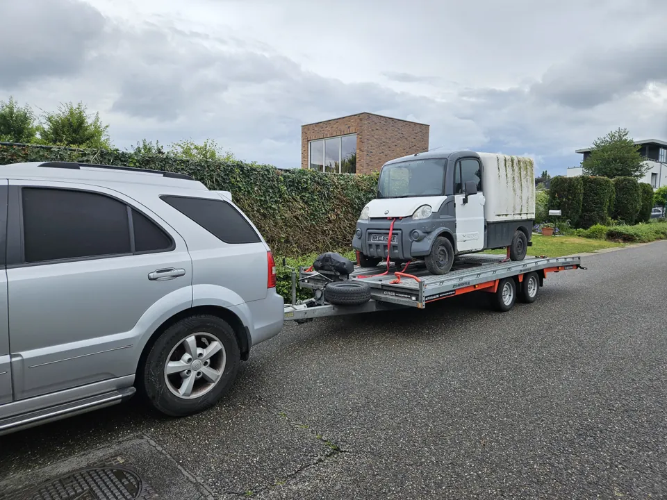Small commercial vehicle on a trailer