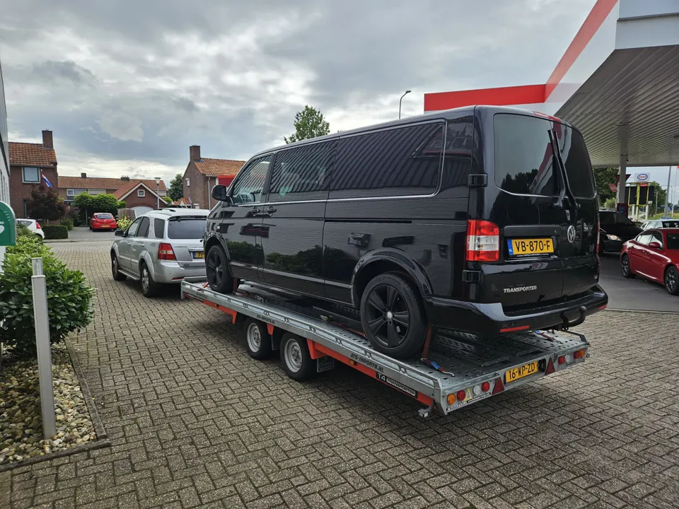 Black van on a trailer